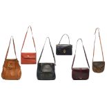 A collection of six leather handbags by Delvaux, H 20 - 37 cm