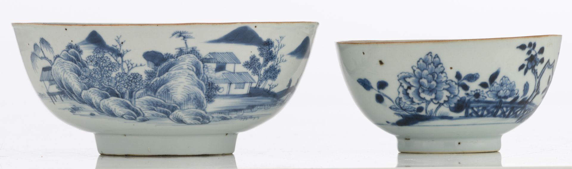 Nine Chinese underglaze-blue decorated café-au-lait glazed dishes with various flower designs; - Image 6 of 15