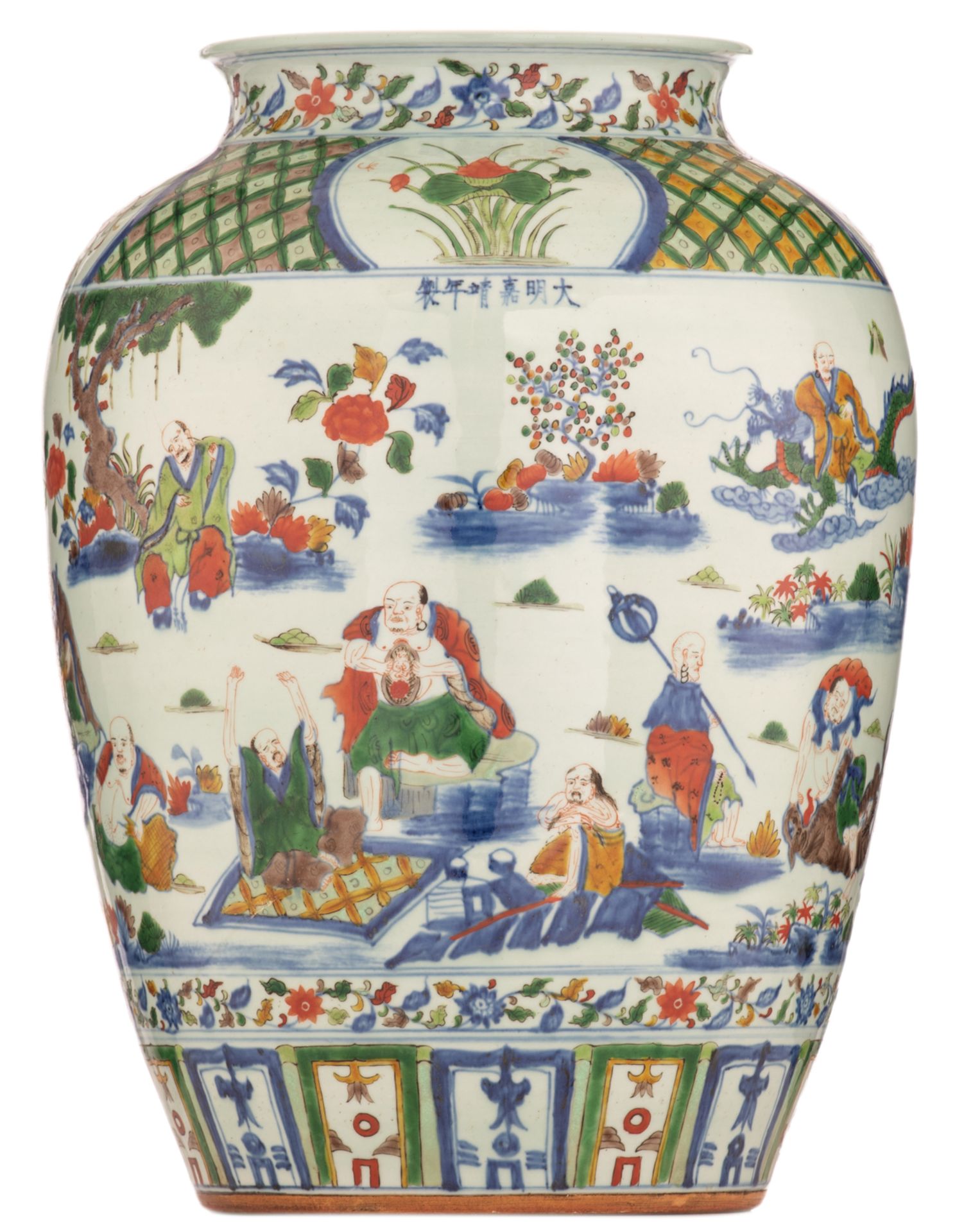 A Chinese wucai jar, decorated with the Eighteen Luohans in a landscape, with a Jiajing mark, H 45