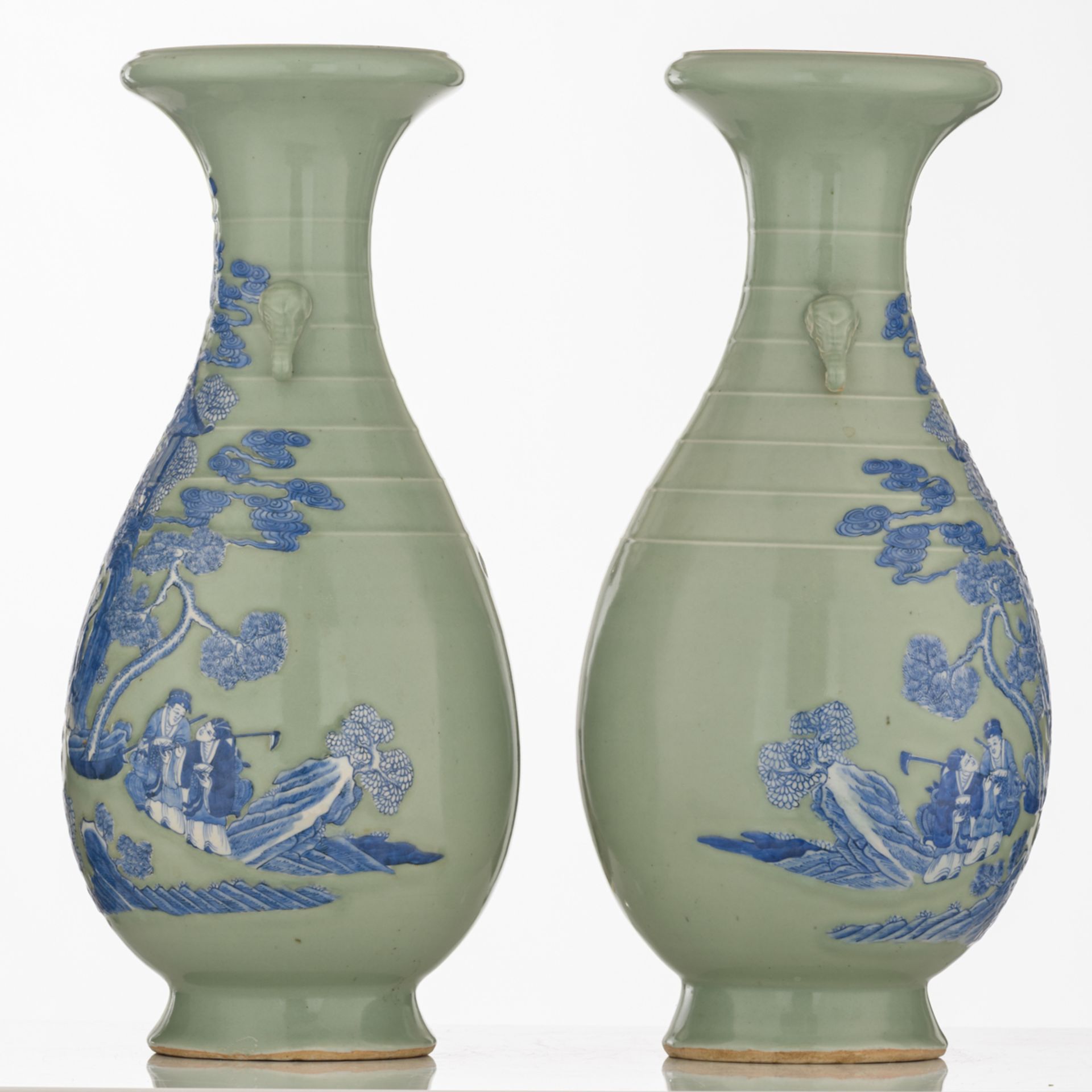 A pair of celadon ground begonia shaped vases, blue and white decorated with a scene from 'The - Image 4 of 6