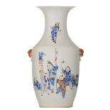 A Chinese polychrome decorated vase with playing boys and signed texts, marked Xuantong, H 44,5 cm