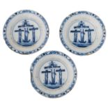 Three late 17th - early 18thC Dutch Delftware plates blue and white decorated with a Calvary, 23 ø