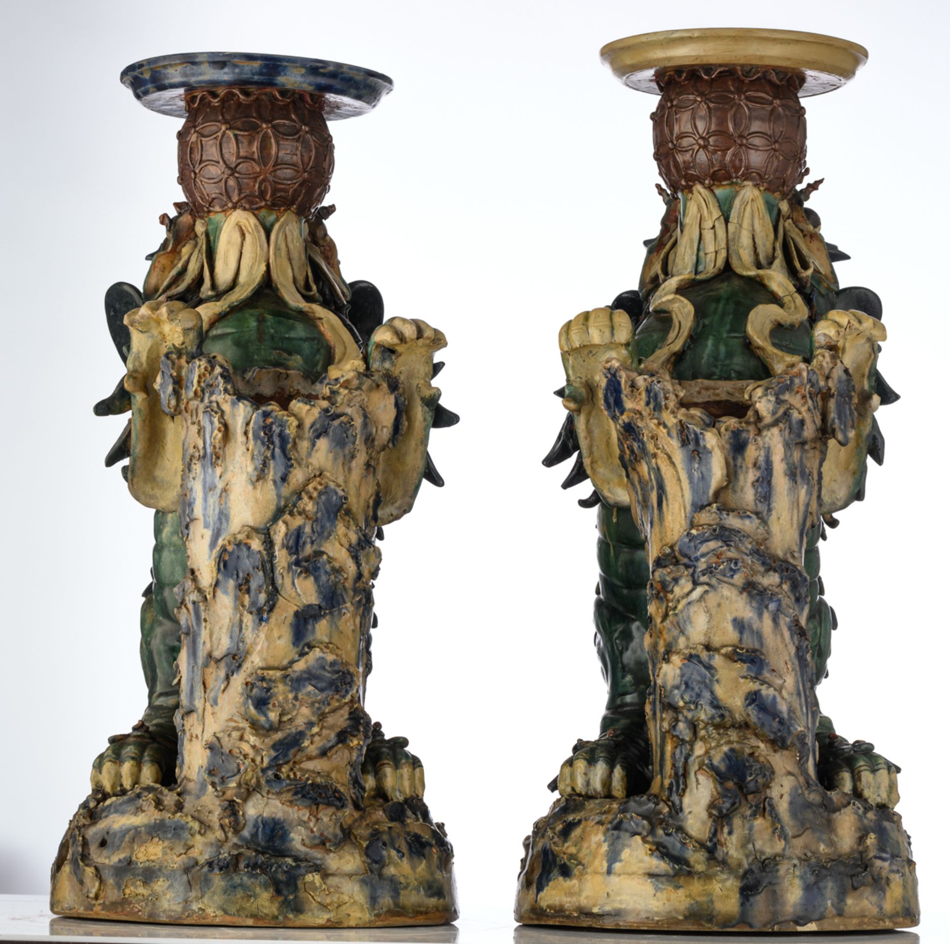 A pair of large polychrome decorated earthenware Fu lions, playing with a ball, H 76,5 - 80 - W 34,5 - Image 3 of 8