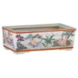 A Chinese famille rose and polychrome decorated rectangular cachepot with erotic scenes, marked,
