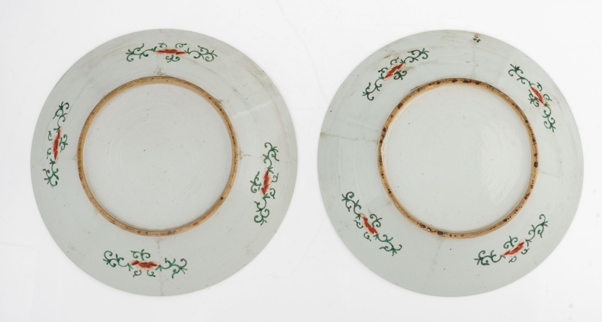 A pair of famille verte chargers, the roundels with playing boys, the central roundel with a scholar - Image 2 of 2