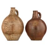 Two stoneware bellarmine jugs decorated with seals, 17thC, the bigger one Cologne and the smaller