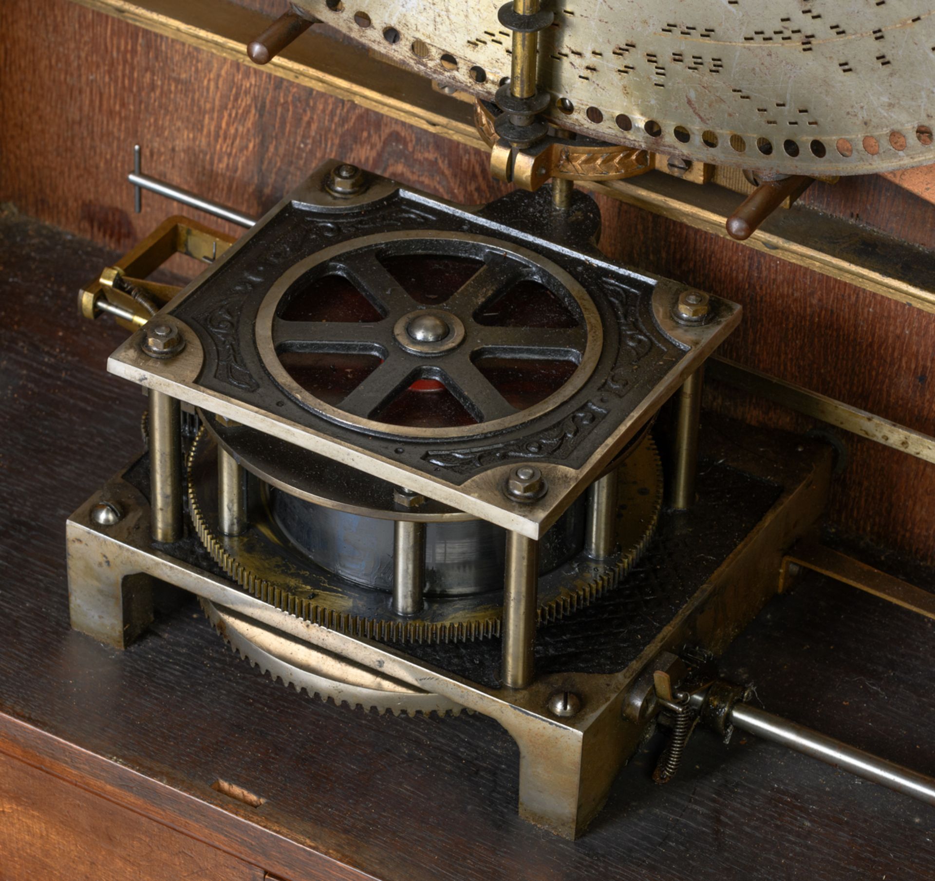 A Renaissance revival walnut hanging Polyphon-type music-box, the door with a chamfered edge mirror, - Image 2 of 6