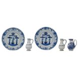 Two late 17th - early 18thC Dutch Delftware plates blue and white decorated with a Calvary, ø 23 cm;