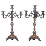 A pair of Rococo revival silver four-armed candlesticks, with German hallmarks, 800/1000, tested