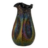 A Loetz type overlay glass display vase, the inside black, the outside green iridescent and oil like