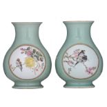 Two Chinese celadon-glazed hu vases, the roundels decorated with birds on flower branches, depicting