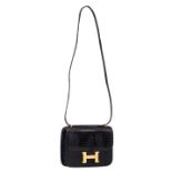 A vintage Hermès black crocodile 'Constance' 18 bag with goldtone hardware
