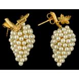 A fine pair of earrings shaped like bunches of grapes, the bunches consisting of cultured pearls and