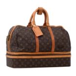 A vintage Louis Vuitton travel bag, H 32 - W 45 - D 26 cm