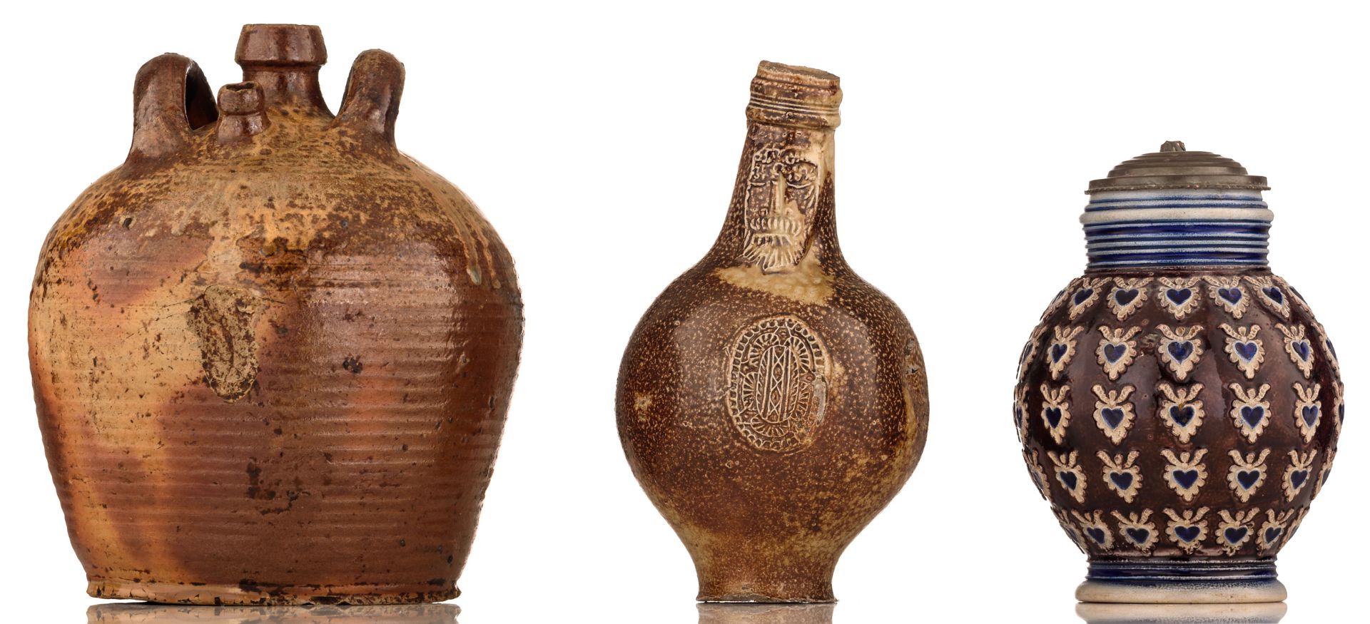 A Frechen stoneware bellarmine jug, 17thC, H 22cm; added: a brown glazed stoneware jug, H 24 cm; - Bild 2 aus 5