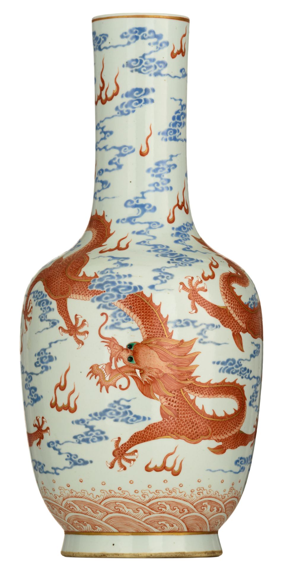 A Chinese polychrome decorated porcelain bottle vase, with the five-clawed dragons in iron red,