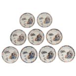 Nine Chinese Imari export porcelain dishes, decorated with a fisherman in a village landscape,