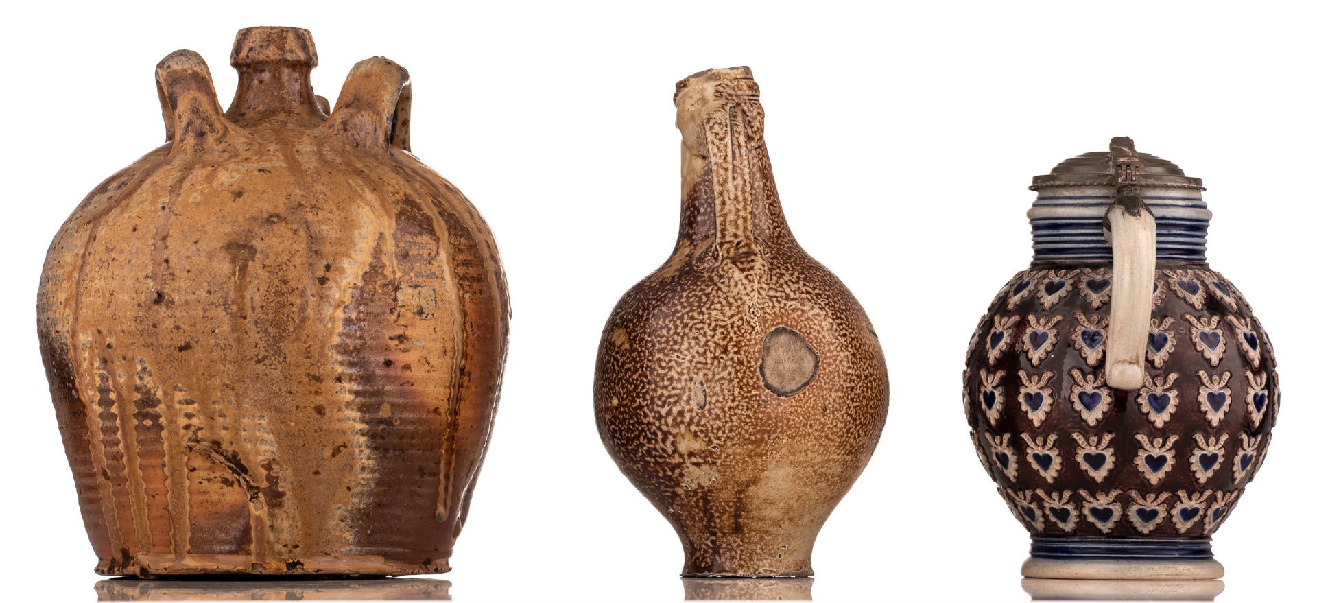 A Frechen stoneware bellarmine jug, 17thC, H 22cm; added: a brown glazed stoneware jug, H 24 cm; - Bild 3 aus 5