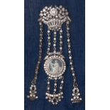 A silver chatelaine with central medallion set with a miniature painting after the antique; set with