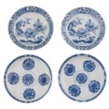 A pair of Chinese Kangxi blue and white 'peony' plates; added: two ditto plates, decorated with a