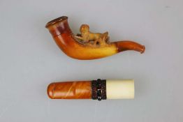 Zwei Teile Rauchutensilien: Zigarrenhalter mit Granatbesatz und Meerschaum; zweites Stück mit