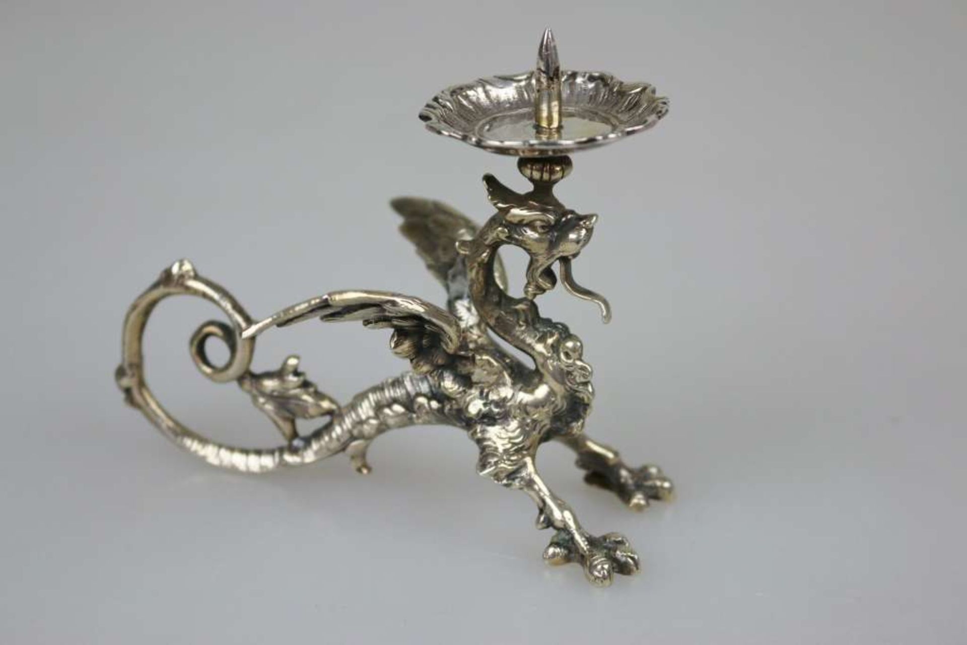 Kerzenleuchter, 835er Silber, gepunzt, Leuchte in der Form eines geflügelten Drachen, als Handhabe