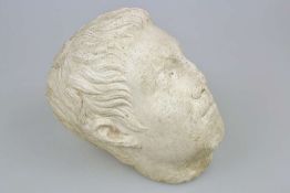 Kopf eines jungen Mannes, H.: ca. 30 cm, wohl Iulisch-Claudisch (1. Hälfte 1. Jh. n. Chr.). Der