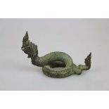 Schlangenfigur/Naga, wohl Thailand, 19./20. Jh., Metall, Schutzgottheit. H. 15,5 cm, L.: ca. 21 cm.