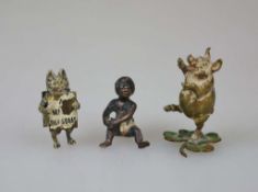 Wiener Bronze, drei Miniaturen, wohl teilweise um 1900, tanzendes Glücksschwein auf Kleeblatt,
