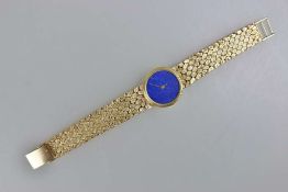 Damenarmbanduhr, 585er Gelbgold, 20. Jh., Lapislazuli Ziffernblatt mit goldenen Zeigern, bez. Swiss,