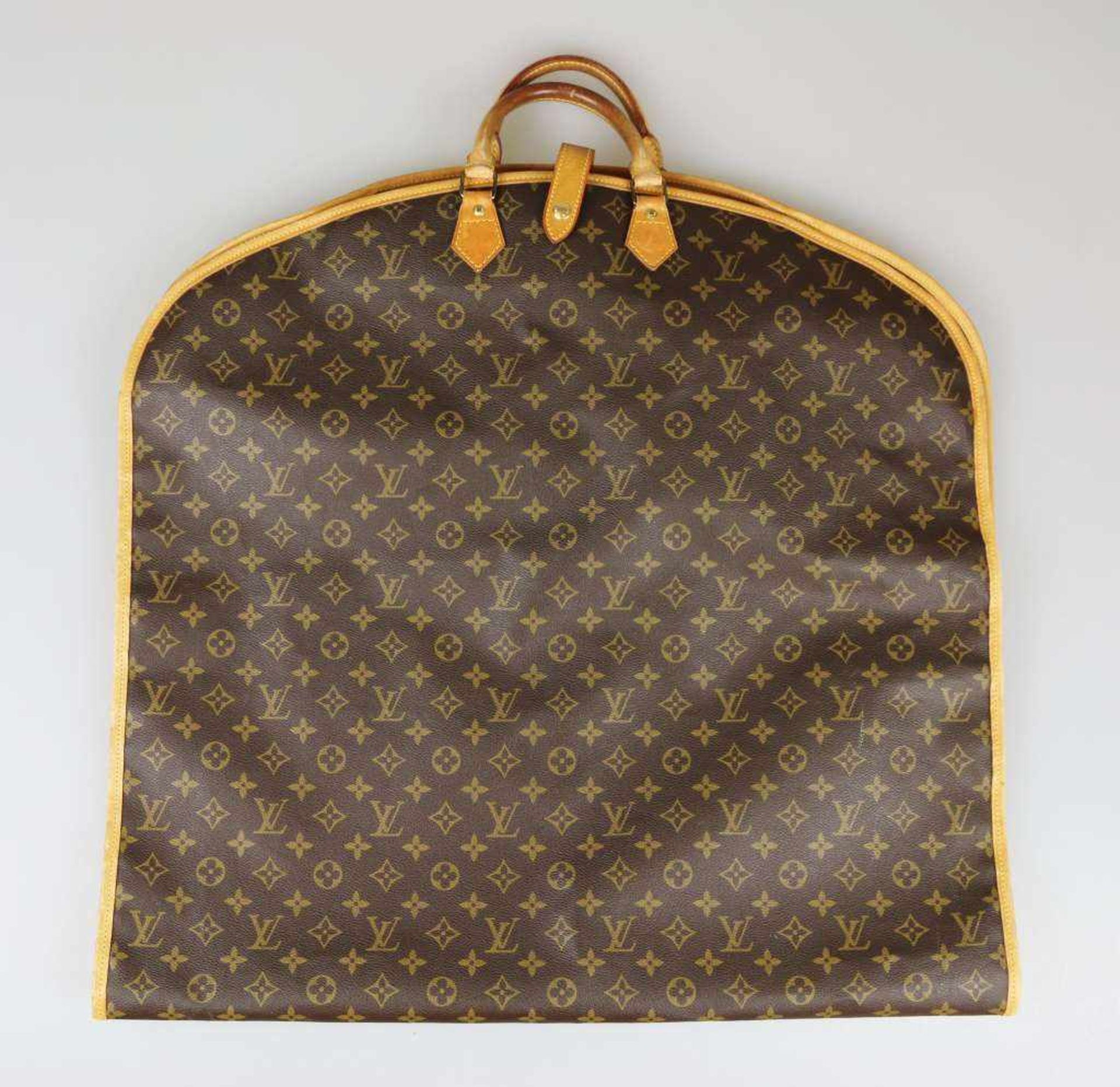 Louis Vuitton, Kleidersack mit Monogramm Canvas, Leder und beschichtetes Leinen, goldene