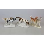 3 Figurengruppen, Jagdhunde, 20. Jh., teilweise sign., alle am Boden gestempelt, u.a. W. Goebel,