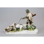 Meissen Figurengruppe, Jäger mit zwei Jagdhunden, Entwurf Otto Jarl 1904, signiert und datiert,