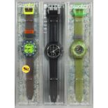 Drei Swatch-Armbanduhren, unterschiedliche Modelle, in der Original-Verpackung, Funktionnicht