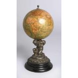 Miniatur-Globus, Ludw. Jul. Heymann, Berlin, um 1910, runder, ebonisierter Holzstand,darauf