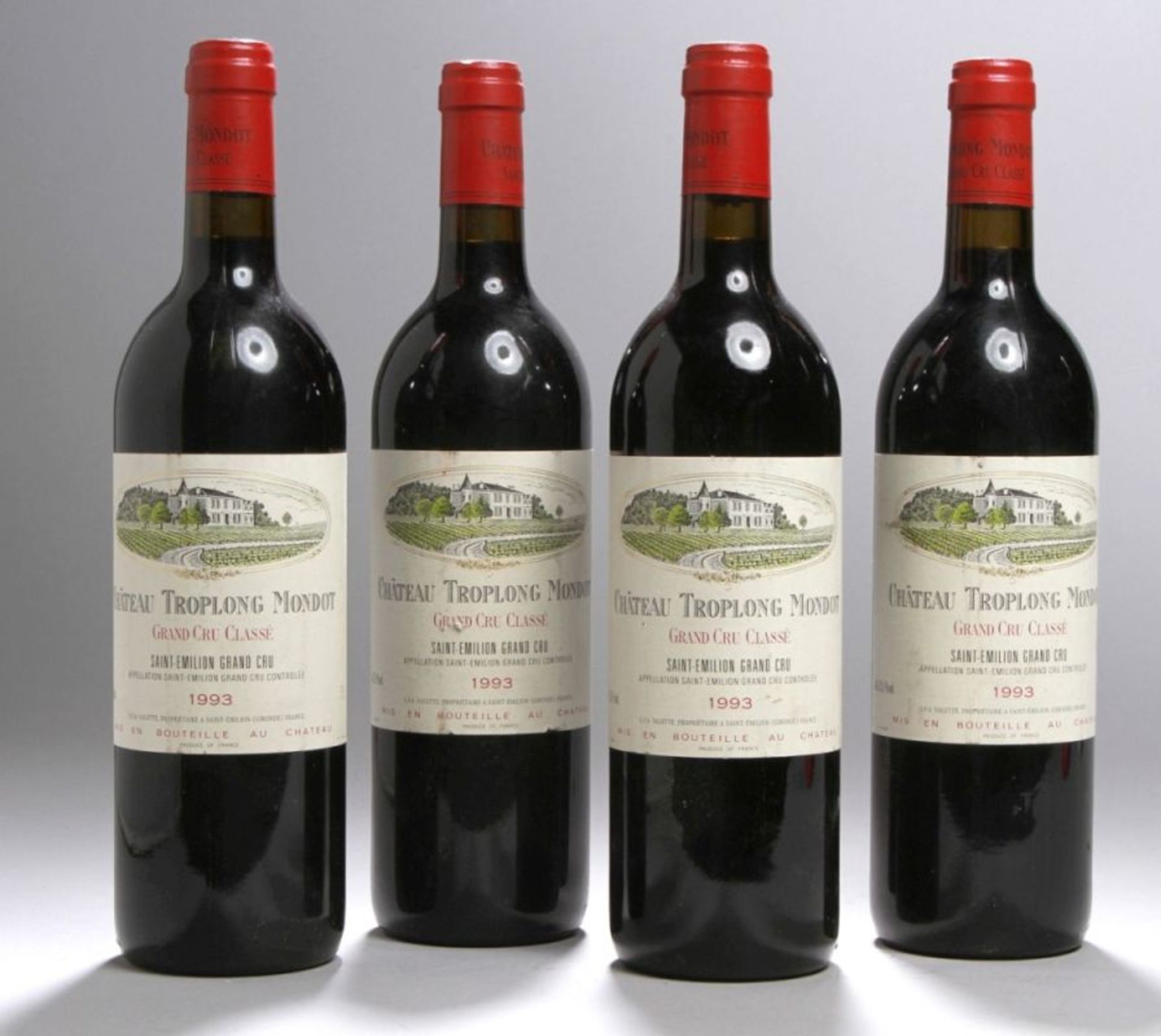 Vier Weinflaschen, Chateau Troplong Mondot, Saint-Emilion, Grand Cru, 1993