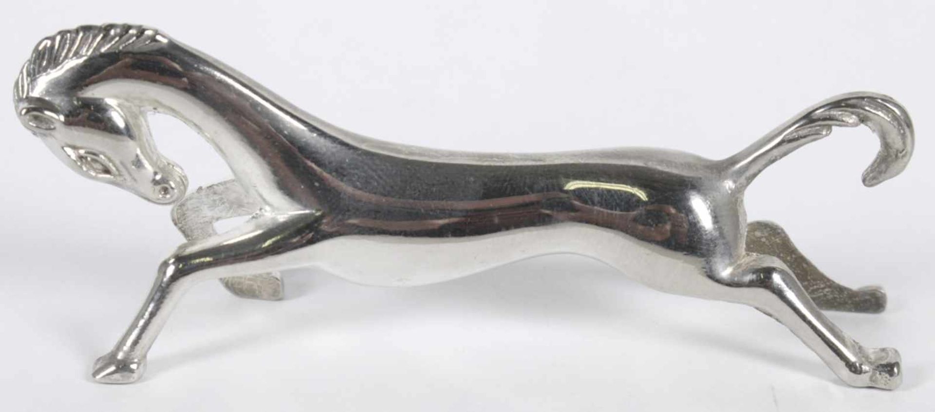 Zwölf Metall-Messerbänke, wohl Frankreich, um 1920, gearbeitet in Form von stilisierten,laufenden - Bild 2 aus 3