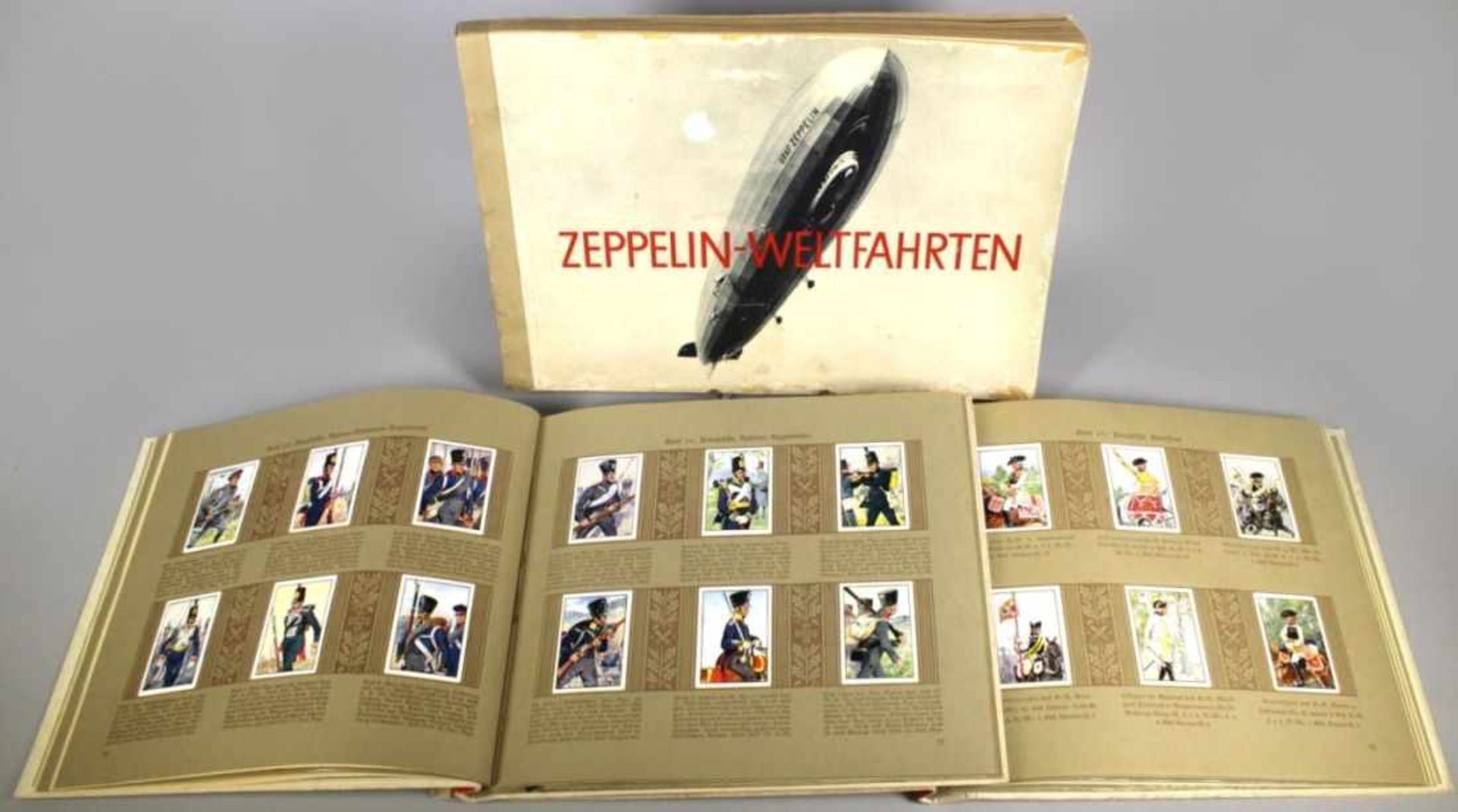 Drei Sammelbilder-Alben, 1. Hälfte 20. Jh., "Uniformen und Zeppelin-Weltfahrten",komplett,