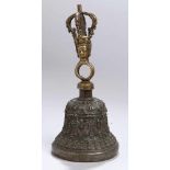 Bronze-Ritualglocke, Tibet, 17./18. Jh., ausschwingende Form mit kronenförmigemTragehenkel mit