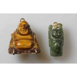 2 Anhänger, "Buddha", ostasiatisch, 1x Tigerauge, Fassung GG 585, rückseitig Schriftzeichen, 1x Jade