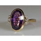 Ring, GG 585, 1 ovaler facettierter Amethyst, 6 Brillanten zus. ca. 0.18 ct., 7 g, RM 17.5 25.00 %