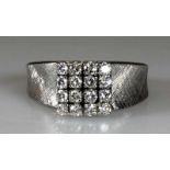 Ring, WG 750, 16 Brillanten zus. ca. 0.40 ct., 7 g, RM 18 25.00 % buyer's premium on the hammer