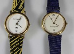 2 Modeschmuck-Uhren, 'Karl Lagerfeld', Quarz, Stahl, rückseitig bezeichnet Montres 174 bzw. 2628,