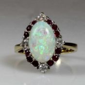 Ring, London, GG 750, weiß belötet, 1 ovaler Voll-Opal-Cabochon, 4 Brillanten zus. ca. 0.20 ct.,