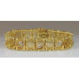 Armband, GG 585, 9 Brillanten zus. ca. 0.90 ct., 18.5 cm lang, 52 g 25.00 % buyer's premium on the