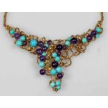 Collier, GG 585, 19 Türkisperlen, 16 Amethystperlen, 37 cm lang, 28 g 25.00 % buyer's premium on the