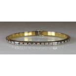 Armband, WG/GG 750, 20 Brillanten zus. ca. 1.0 ct., alle etwa w/vs-vvs, 19.4 g, 18 cm lang