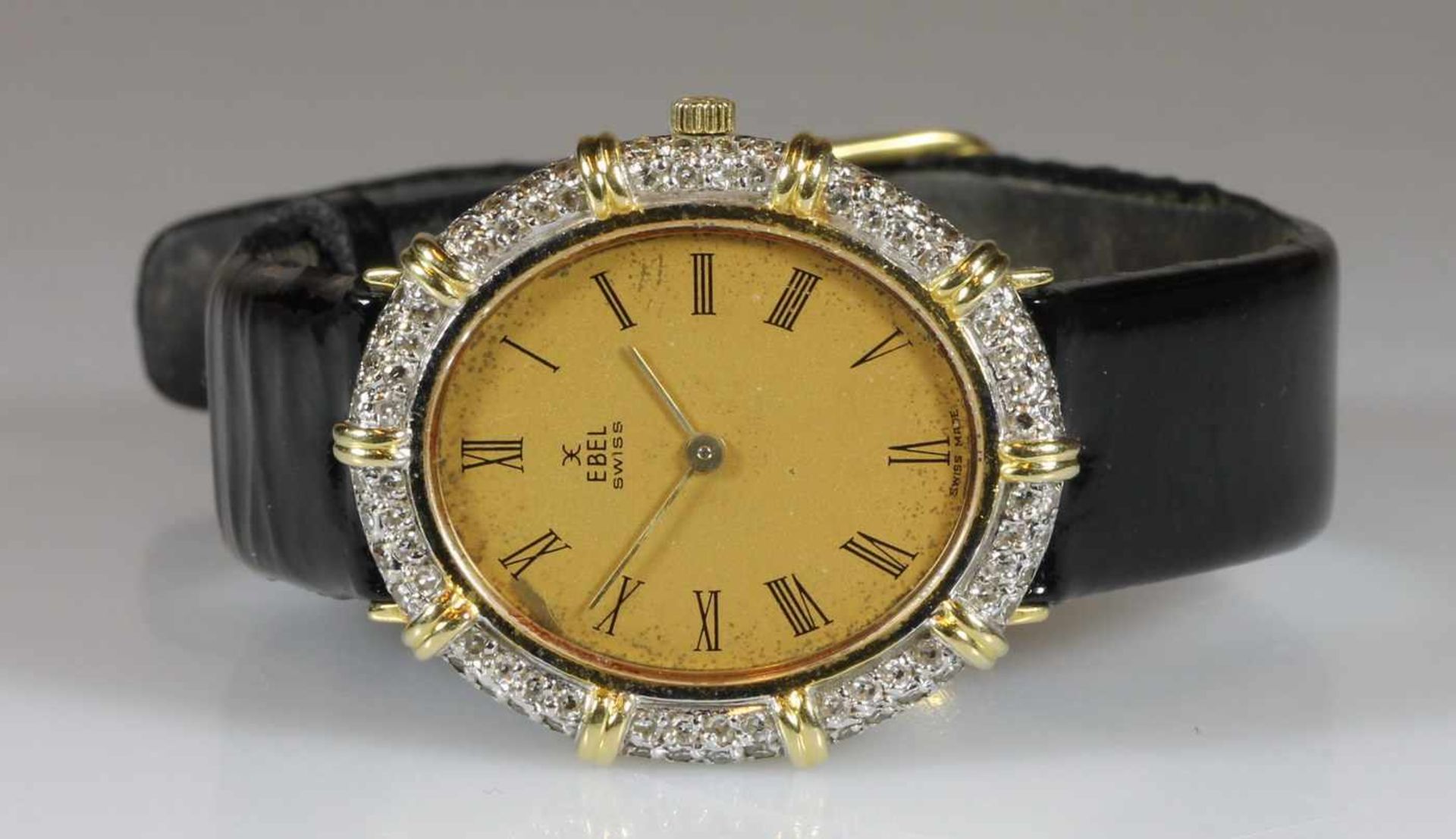 Damenarmbanduhr, Ebel, WG/GG 750, Handaufzug, goldfarbenes Zifferblatt, römische Stundenziffern, - Bild 2 aus 2