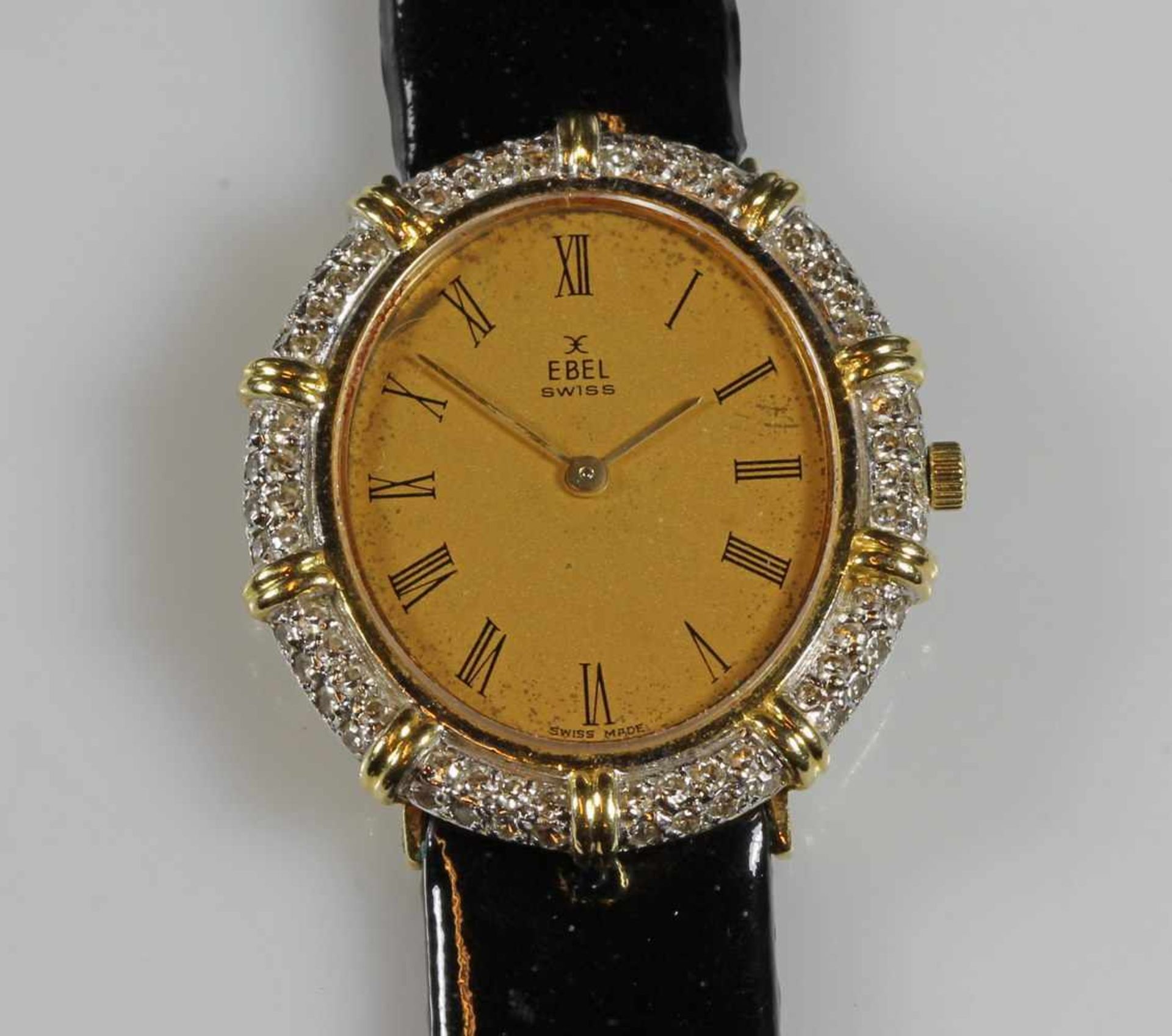 Damenarmbanduhr, Ebel, WG/GG 750, Handaufzug, goldfarbenes Zifferblatt, römische Stundenziffern,