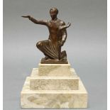 Bronze, braun patiniert, "Fackelträger", auf der Plinthe bezeichnet (W ?) König, auf Steinsockel, 13